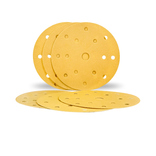 Dischi abrasivi gialli sovrapposti su fondo bianco